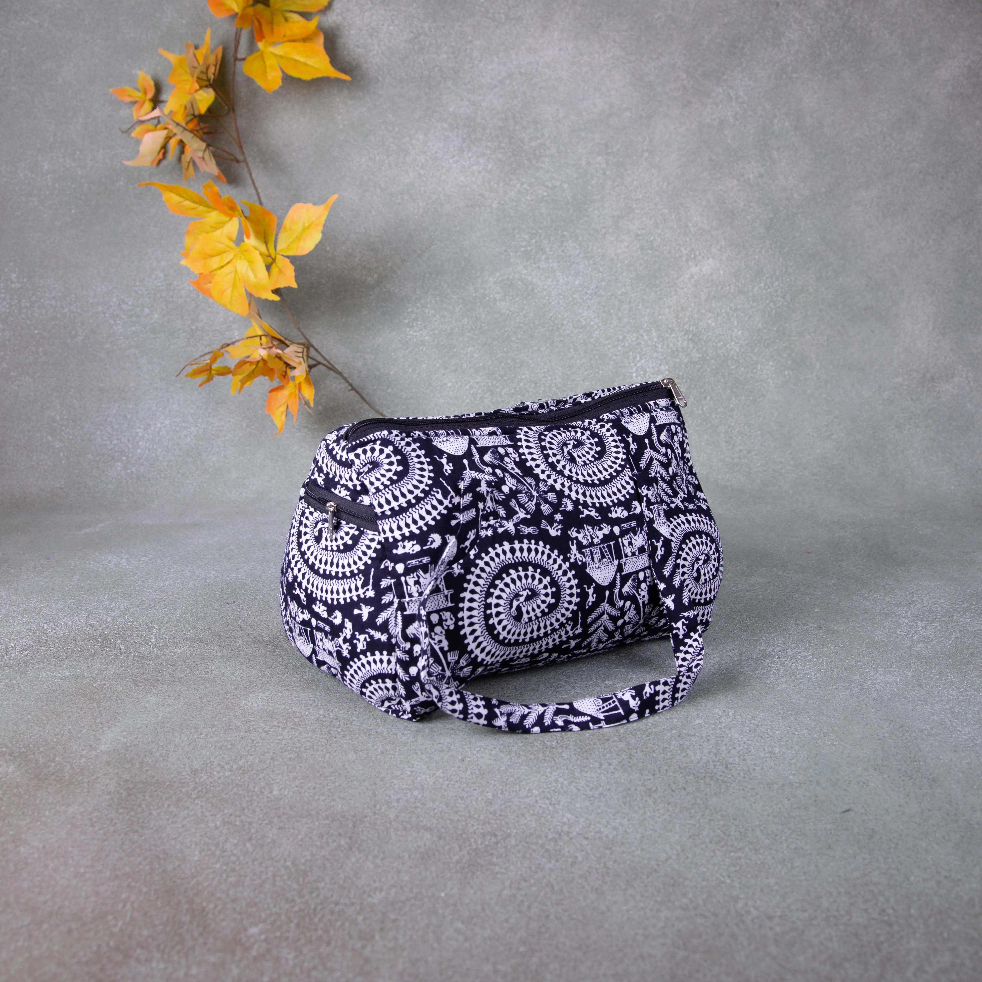 Barrel Handbags Black Colour with Tribal prints.