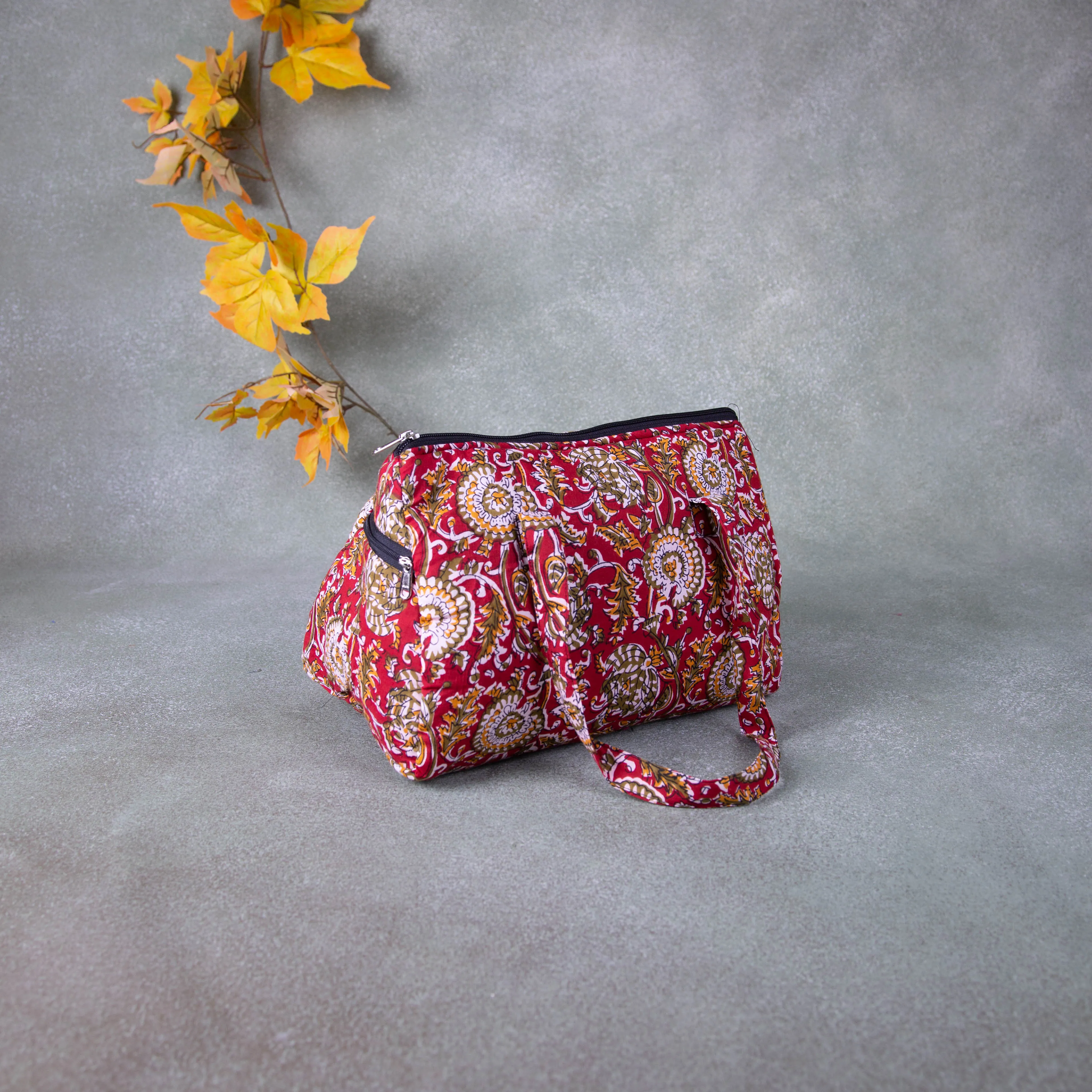 Barrel Handbags Red with Mustered Flower Design.