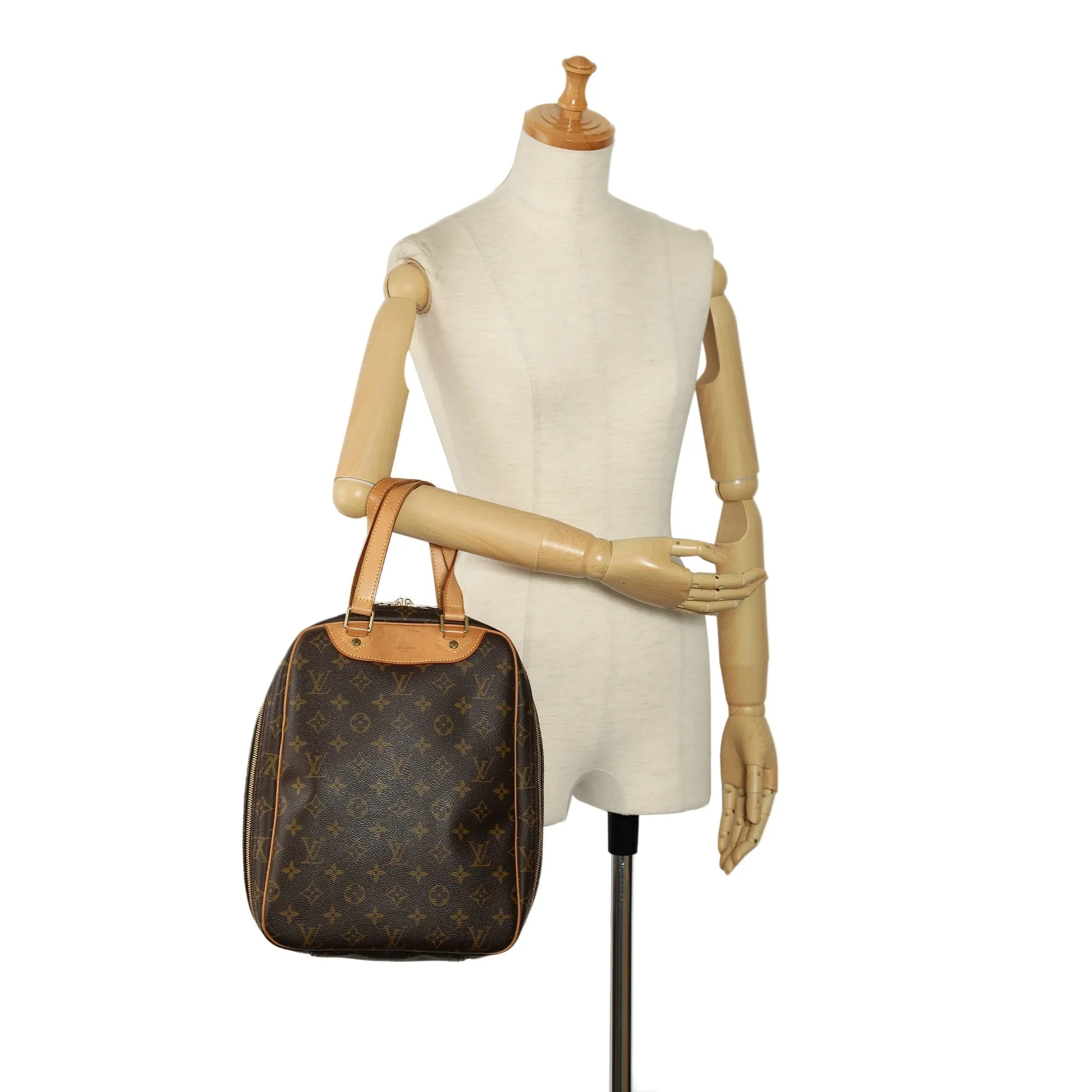 Brown Louis Vuitton Monogram Excursion Handbag