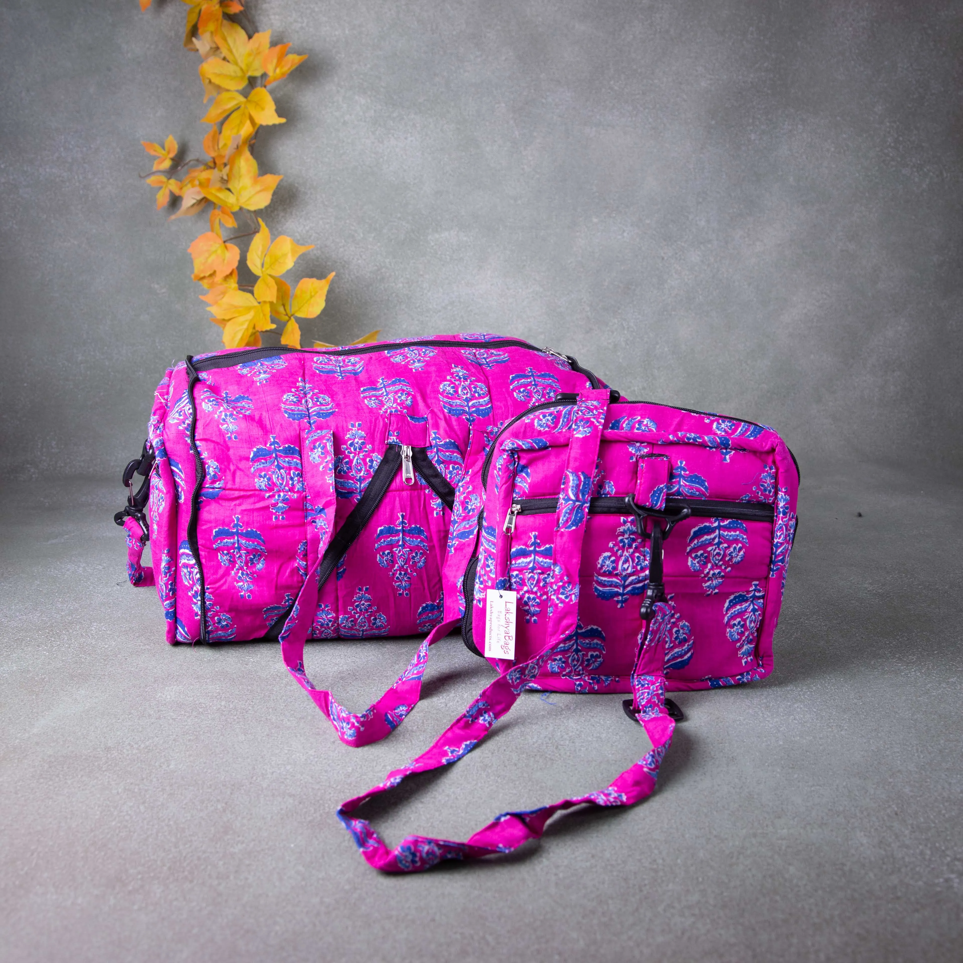 Expandable Travel Bag Pink Colour with Blue and White Flower Design.