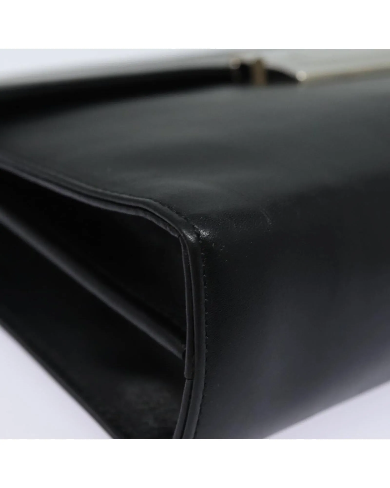 Leather Clutch Bag with Metal Accents and Minimalist Design