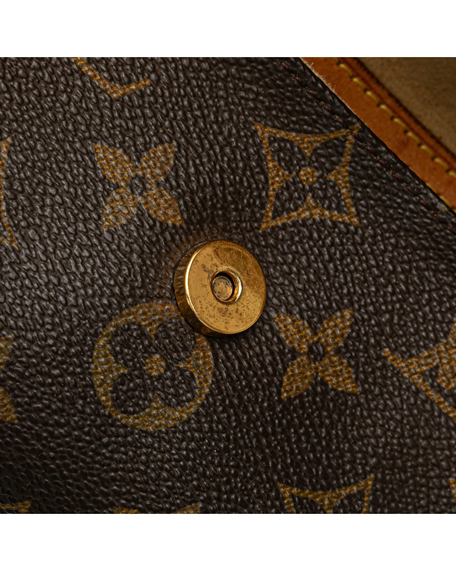 Monogram Pochette Twin PM with Vachetta Leather Trim and Magnetic Closure